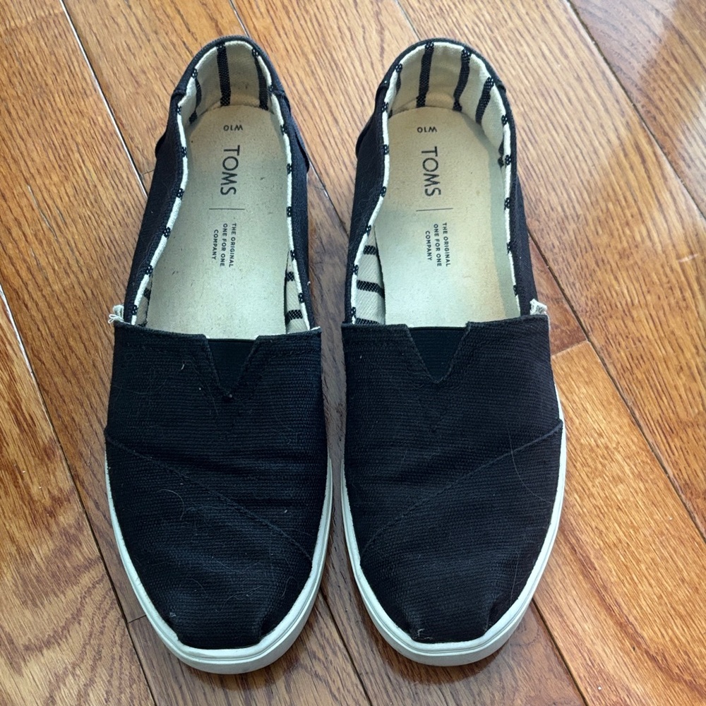 TOMS Black Canvas Slip-Ons